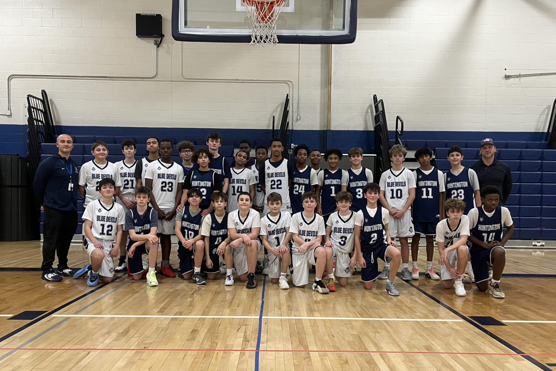  The Finley boys' basketball teams with their coaches this winter.   