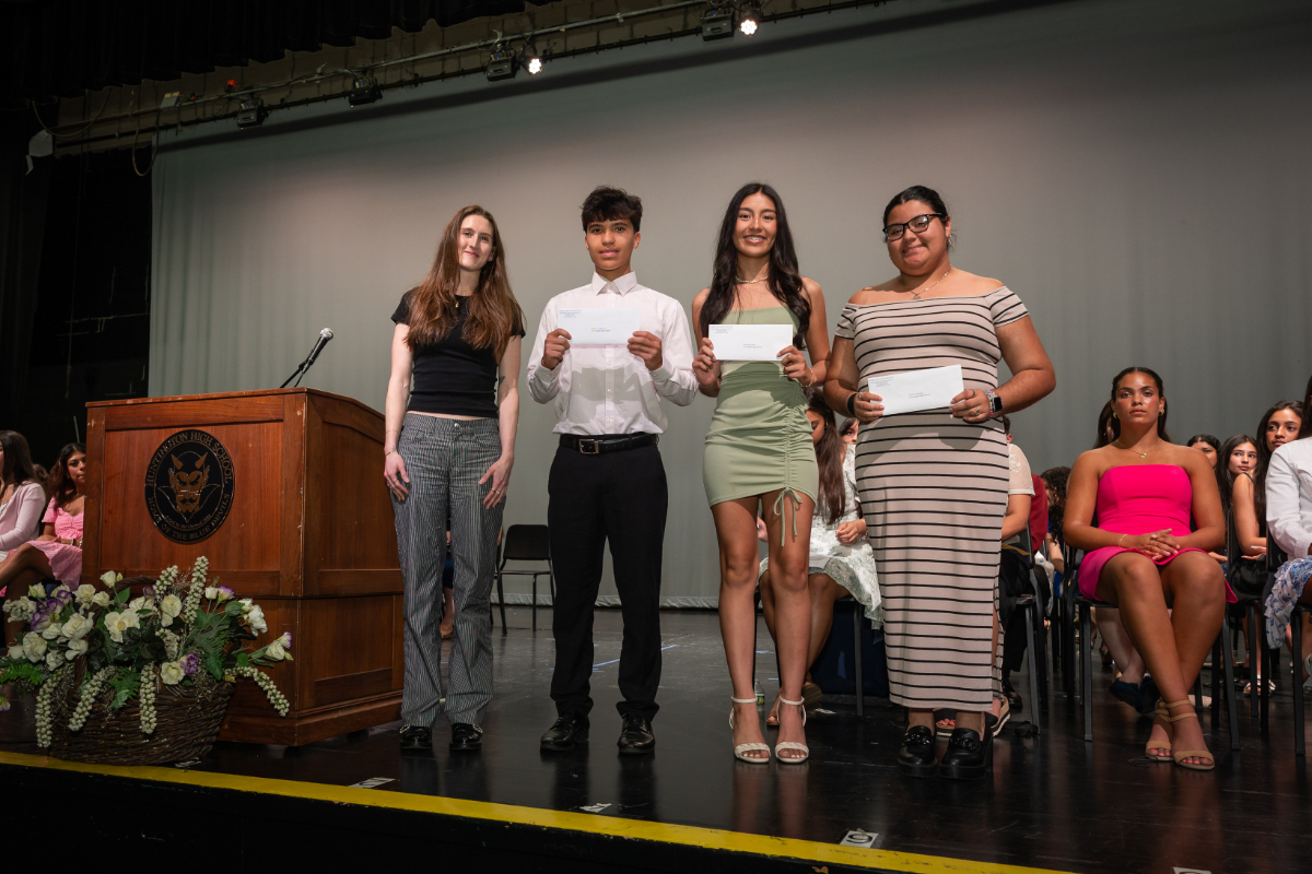 Morgan Pius with scholarship winners Rudis Villatoro Benitez, Heileen Torres and Kellee Benitez. (Darin Reed photo.)