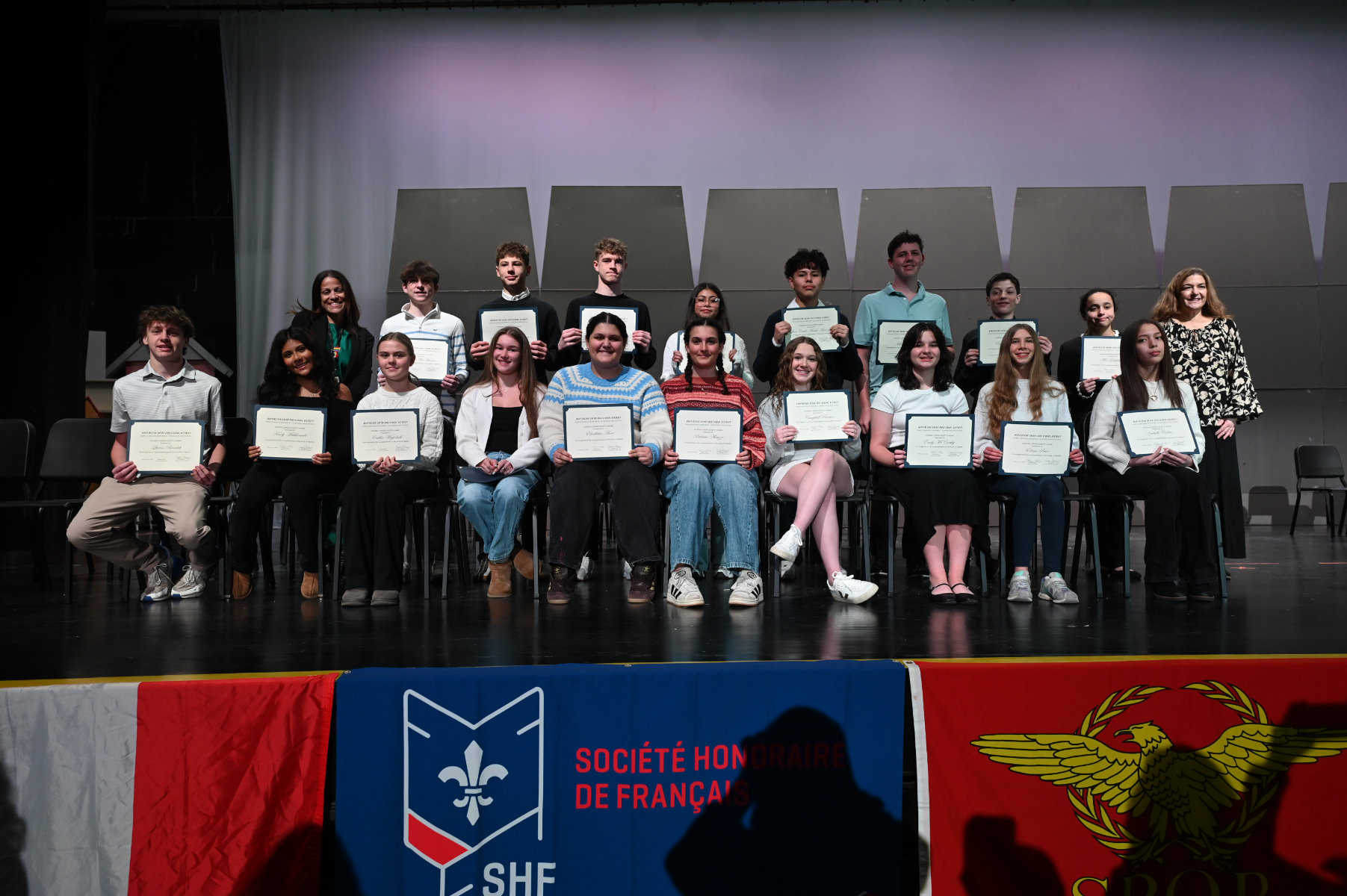  Newly inducted Spanish Honor Society members with their certificates   