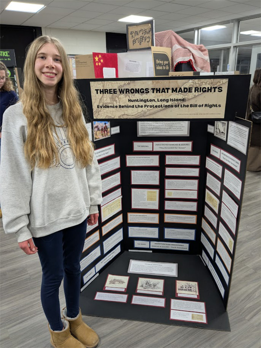  Elena Prior with her exhibit titled Three Wrongs That Made Rights.  