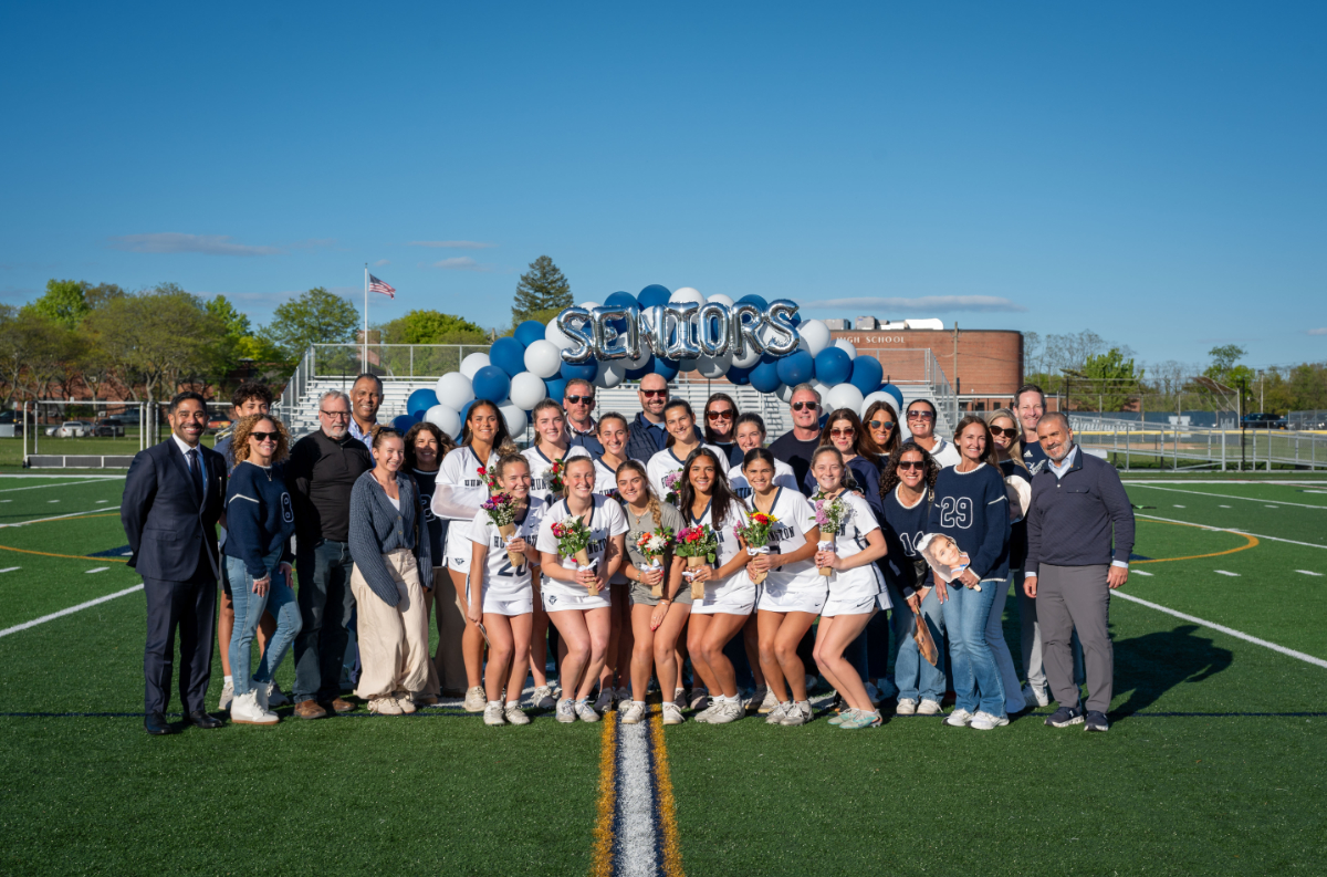  The Huntington seniors with their parents and family members at Alumni Field. (Darin Reed photo.)  