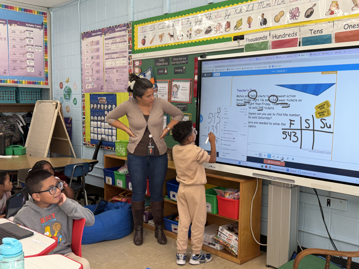  Math Coach Mrs. Leon helps Jefferson students explored multiple strategies for success.