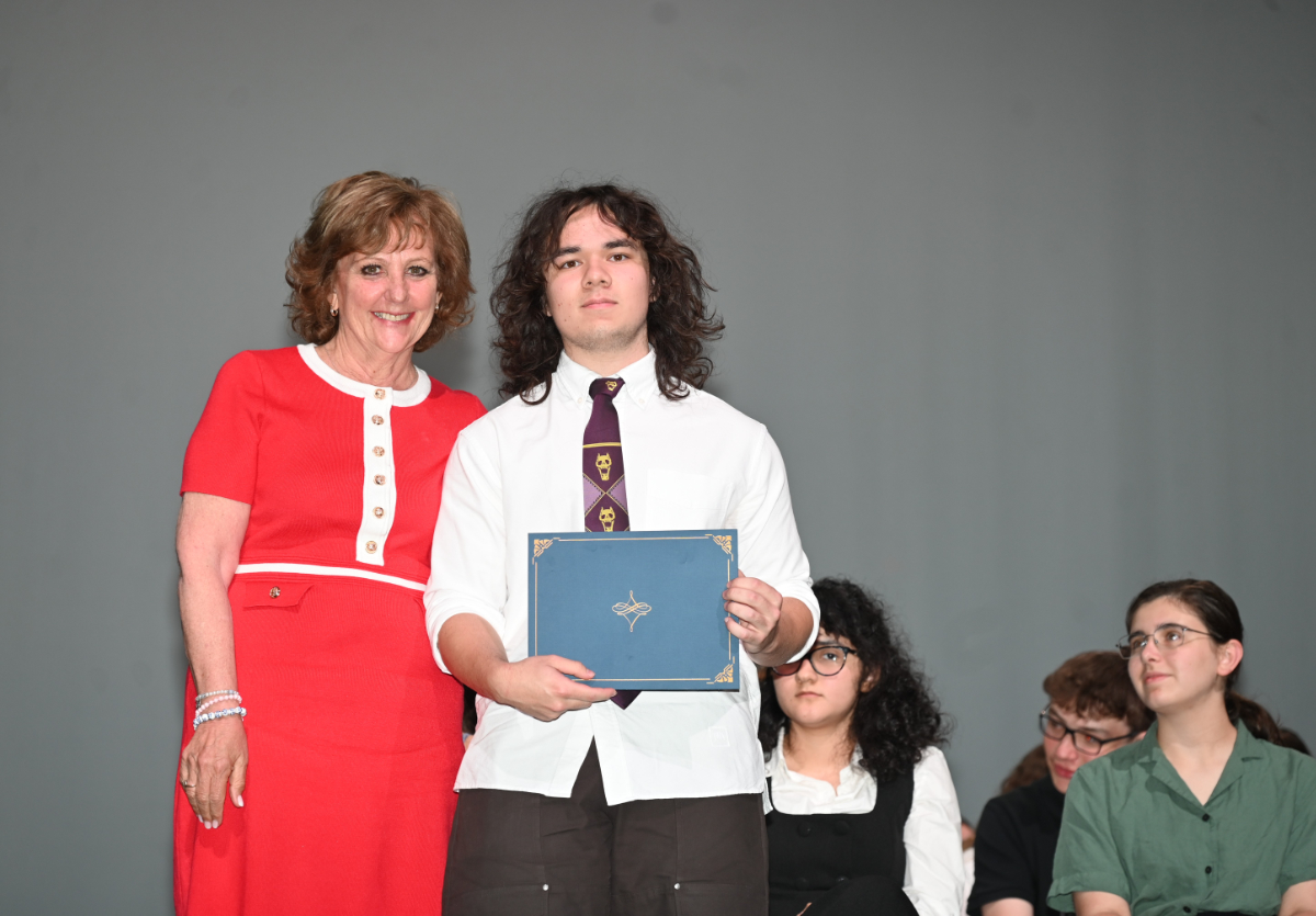  Theresa Grossane presented the Joan Lehnert Award to Dylan Wong.  