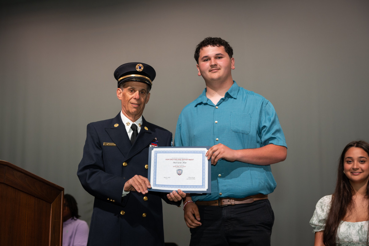  E-Chief Neil Getter with Howard Munson Scholarship recipient Marciano Aloe. (Darin Reed photo.)  