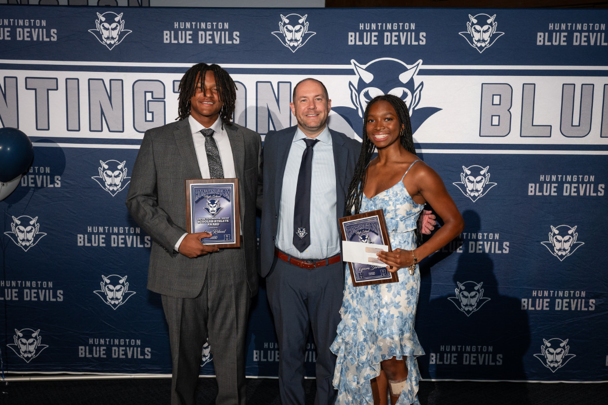  Christopher Hender with Jean Riboul and Kymora Dorvilus. (Darin Reed photo.)  
