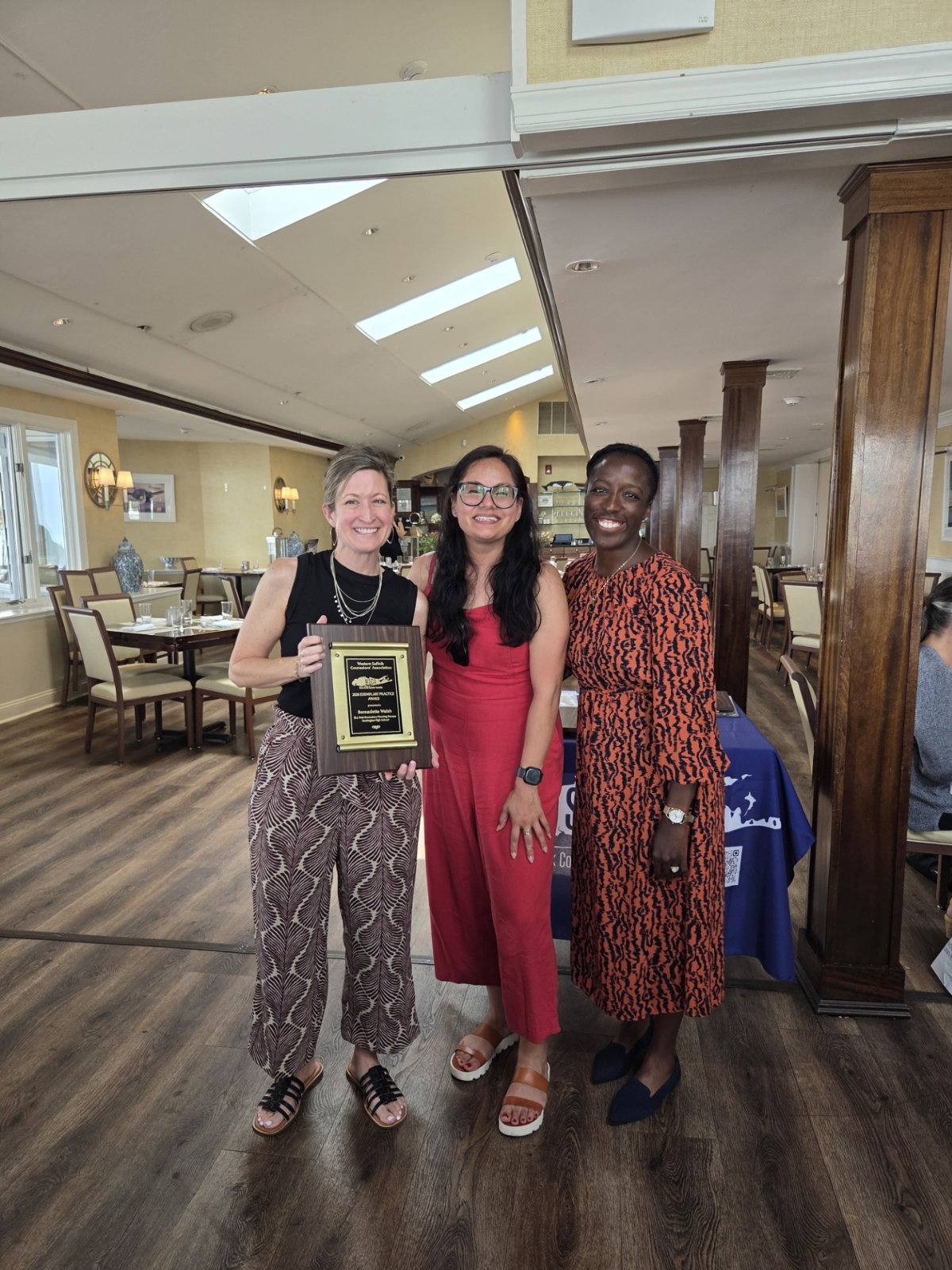  Huntington counselor Bernadette Walsh and her colleagues at the awards luncheon.   