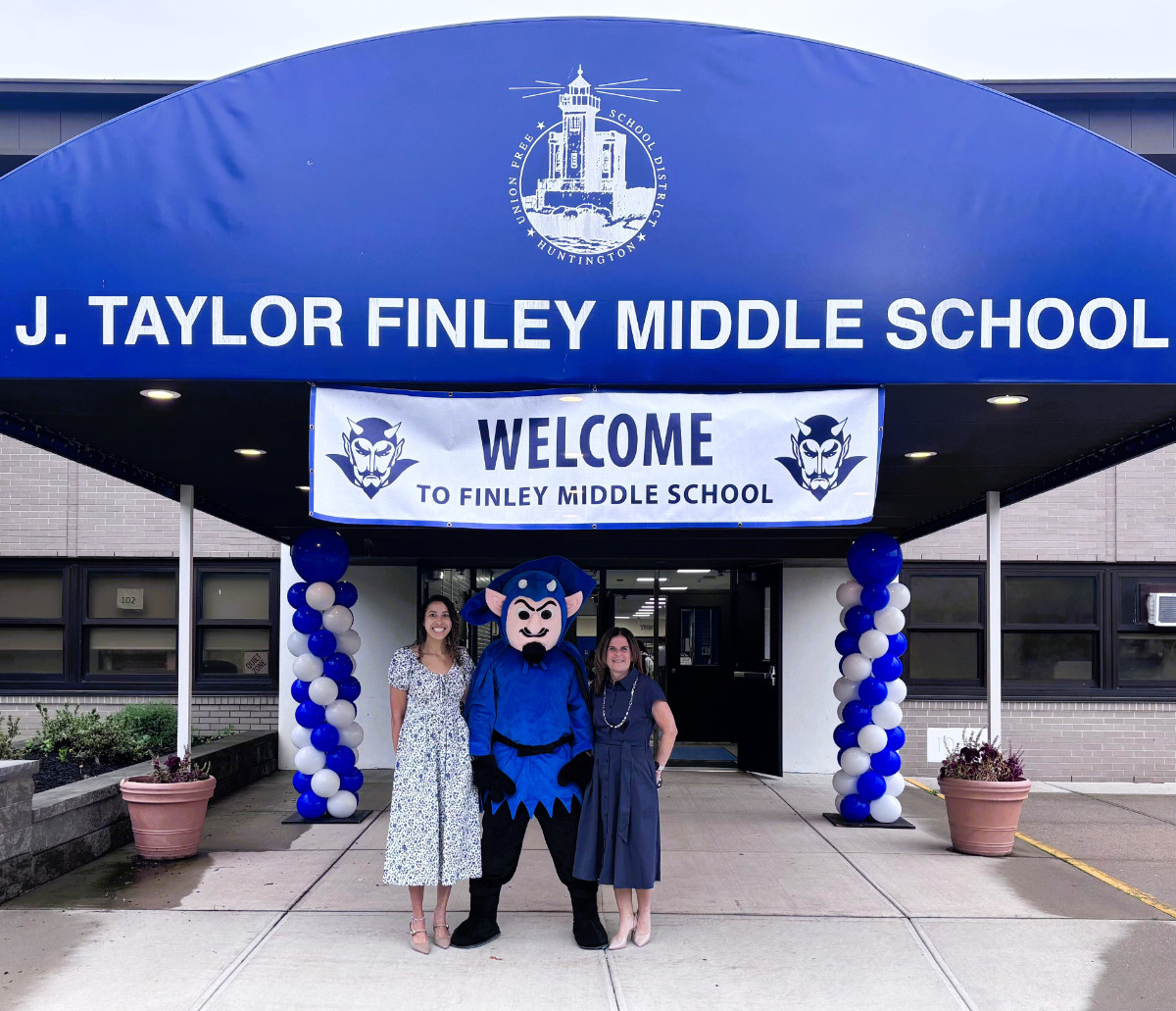  Principal Traci Roethel and Assistant Principal Alexa Estrada with Mr. Blue Devil.  